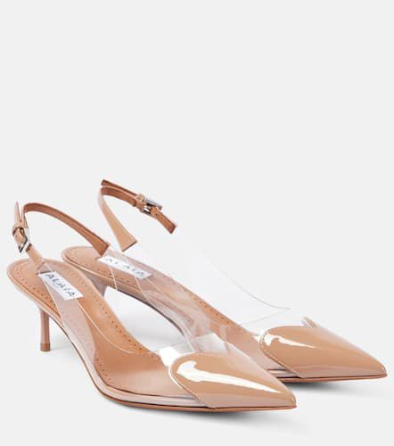 AlaÃ¯a Le CÅur PVC and patent leather slingback pumps - Alaia - Modalova