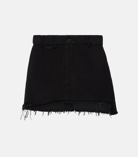 Minifalda de denim con efecto desgastado - Balenciaga - Modalova