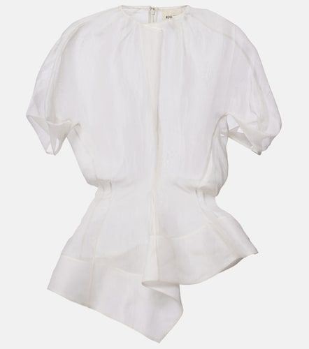 Khaite Top Rumi de seda con peplum - Khaite - Modalova