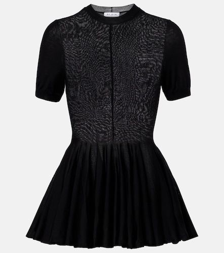 Alaia Peplum virgin wool top - Alaia - Modalova