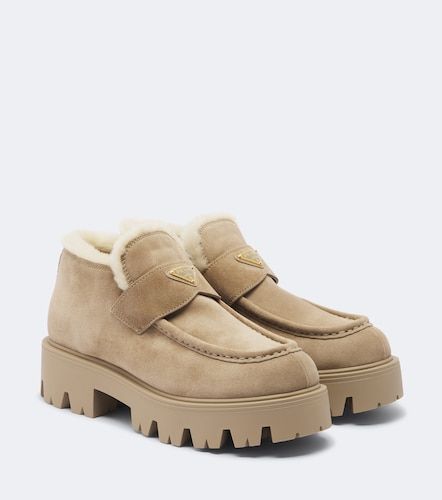 Shearling-trimmed suede platform ankle boots - Prada - Modalova