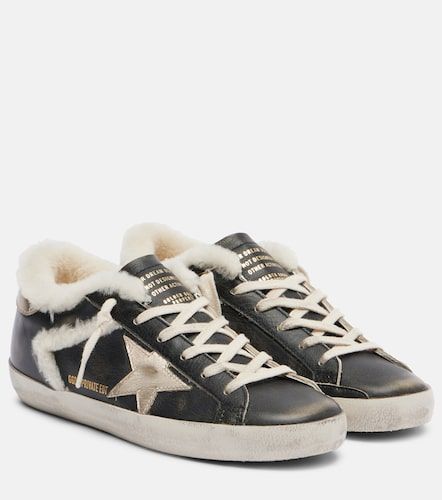 Super-Star shearling-trimmed leather sneakers - Golden Goose - Modalova
