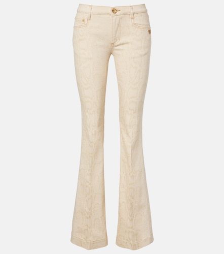 Jeans flared con stampa serpente - Roberto Cavalli - Modalova