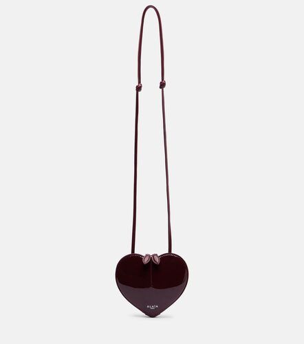 Le Cour Small patent leather crossbody bag - Alaia - Modalova