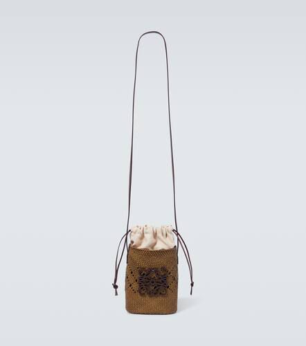 Paula's Ibiza AjourÃ© Anagram raffia bucket bag - Loewe - Modalova