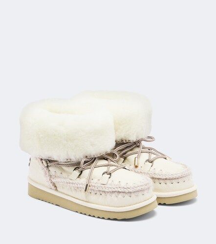 Shearling-lined leather ankle boots - Mou - Modalova