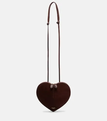 Le Cour Small leather and suede crossbody bag - Alaia - Modalova