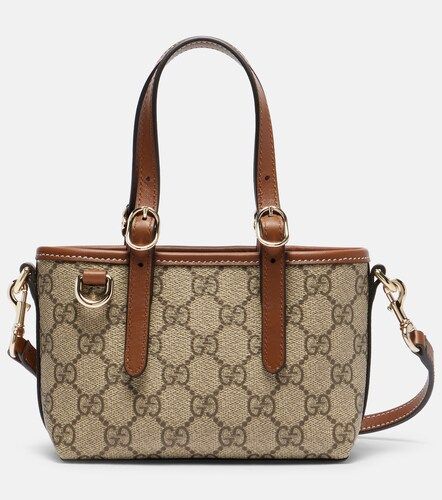 GG Canvas leather-trimmed top-handle bag - Gucci - Modalova