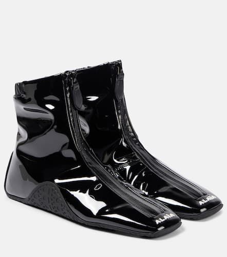 AlaÃ¯a Sneaker faux patent leather ankle boots - Alaia - Modalova