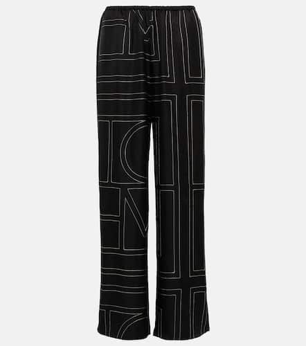 Pantalones anchos de seda con logo - Toteme - Modalova
