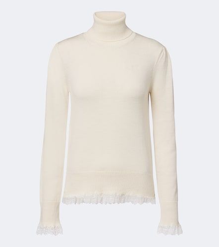 Rollkragenpullover aus Wolle mit Spitze - Ganni - Modalova