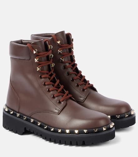 Rockstud leather combat boots - Valentino Garavani - Modalova