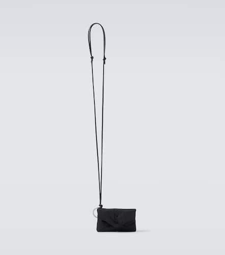 Cassandre Mini leather-trimmed crossbody bag - Saint Laurent - Modalova