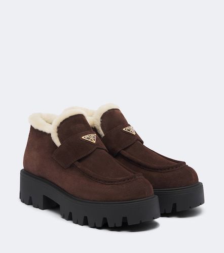 Shearling-lined suede ankle boots - Prada - Modalova