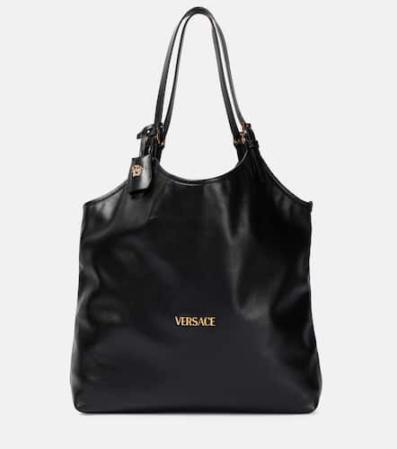 Versace Tag Large leather tote bag - Versace - Modalova