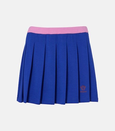 Minifalda Medusa de piqué de algodón plisada - Versace - Modalova