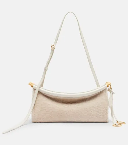 Le Click East West Small shearling shoulder bag - Alaia - Modalova