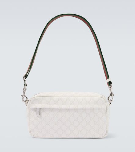 Bolso cruzado Medium de lona GG - Gucci - Modalova