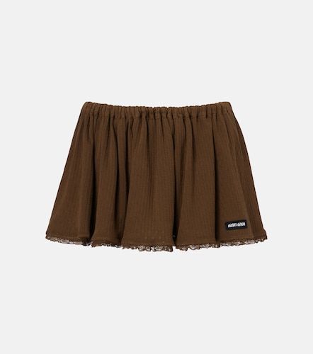 Minigonna in cotone pointelle con pizzo - Miu Miu - Modalova