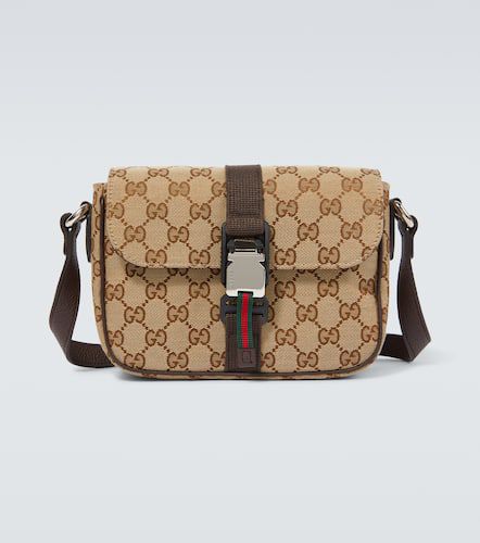 GG canvas Mini leather-trimmed crossbody bag - Gucci - Modalova