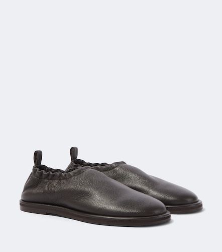 Korine leather slip-on shoes - Studio Nicholson - Modalova