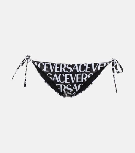 Versace Slip bikini con logo - Versace - Modalova