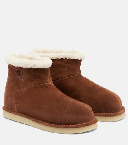 Stivaletti in suede e shearling - Miu Miu - Modalova