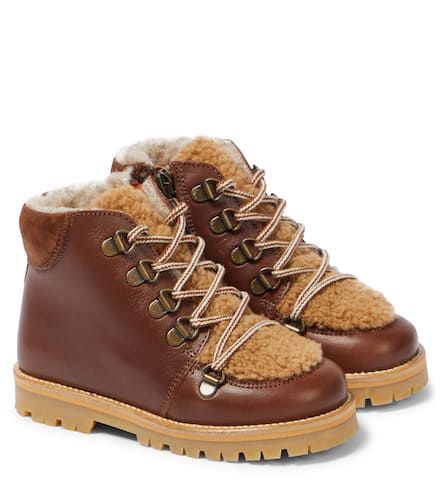 Shearling-trimmed leather boots - Petit Nord - Modalova