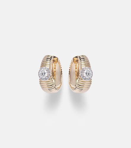 Disco 14kt huggies with diamonds - Stone and Strand - Modalova