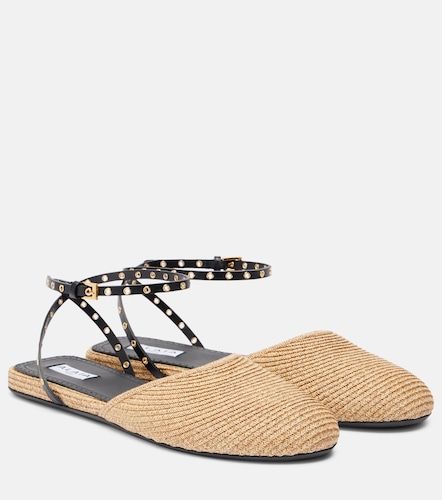 Alaia Leather-trimmed raffia flats - Alaia - Modalova