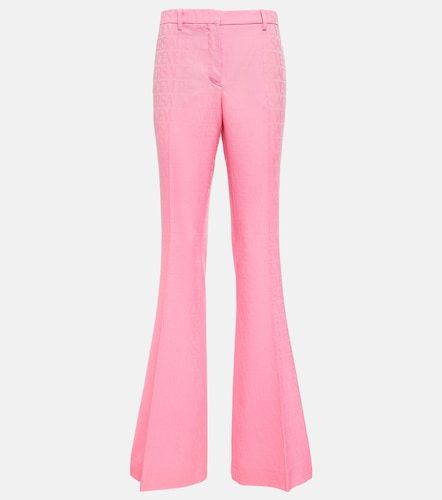 Pantalón flared Allover de lana - Versace - Modalova