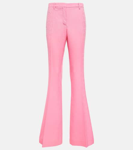 Allover flared wool pants - Versace - Modalova