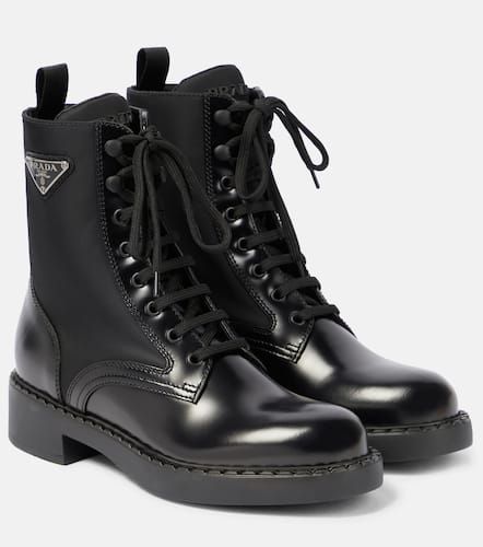 Nylon and leather combat boots - Prada - Modalova