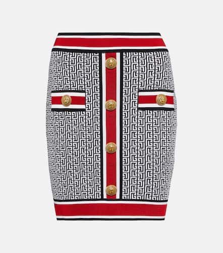 Monogram embellished knit miniskirt - Balmain - Modalova