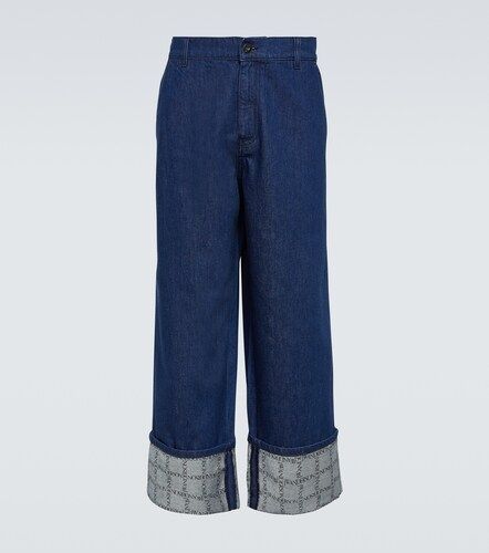 Jeans a gamba larga con logo - JW Anderson - Modalova