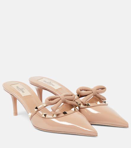 Rockstud bow-detail patent leather mules - Valentino Garavani - Modalova