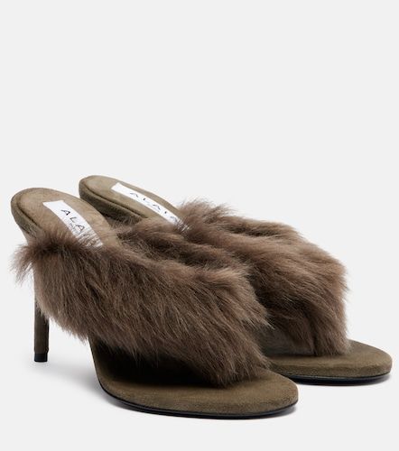 Shearling-trimmed thong sandals - Alaia - Modalova