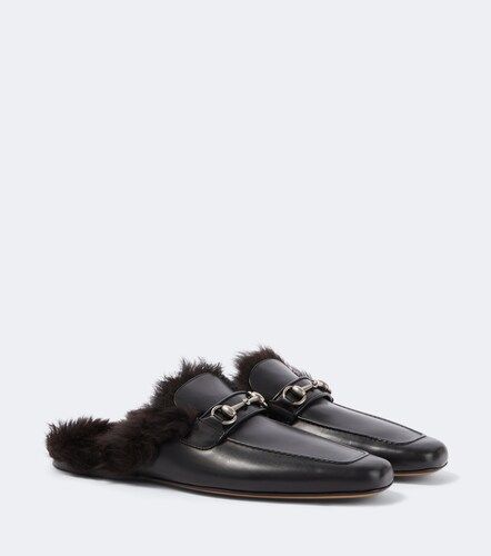 Mules Horsebit in pelle e shearling - Gucci - Modalova