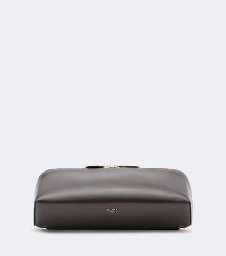 Alaia Delta Small leather clutch - Alaia - Modalova