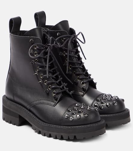 Embellished leather biker boots - Junya Watanabe - Modalova