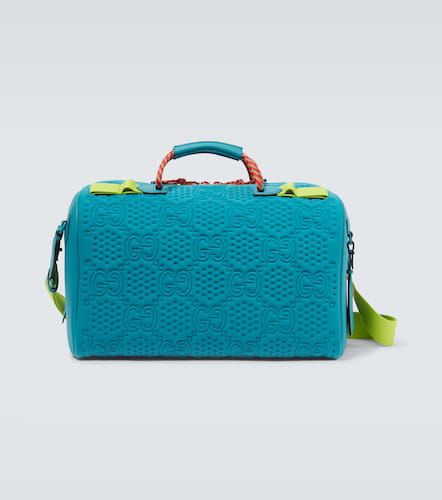 Embossed GG leather-trimmed duffel bag - Gucci - Modalova