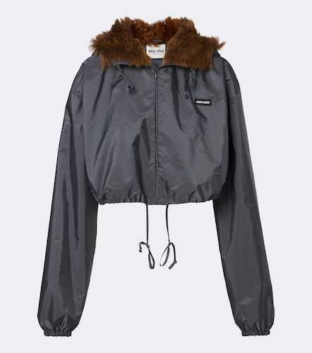 Shearling-trimmed technical jacket - Miu Miu - Modalova