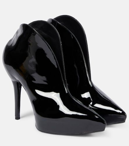Booties Slick patent leather ankle boots - Alaia - Modalova