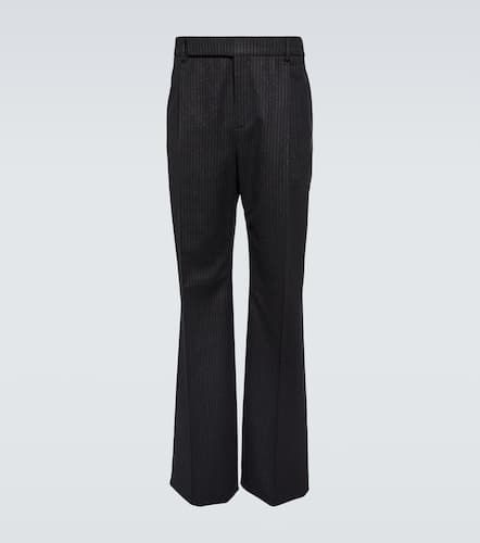 Pinstripe wool flannel flared pants - Saint Laurent - Modalova