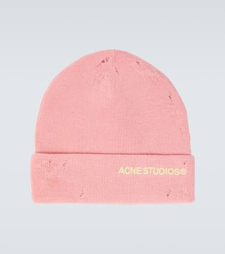 Ribbed-knit distressed wool beanie - Acne Studios - Modalova