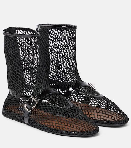 Fishnet leather-trimmed ankle boots - Alaia - Modalova
