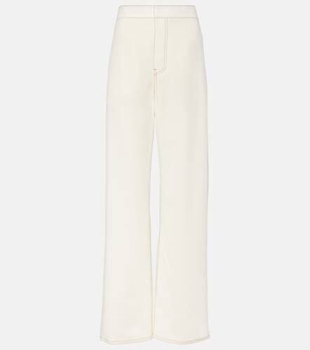 AlaÃ¯a High-rise wool-blend wide-leg pants - Alaia - Modalova