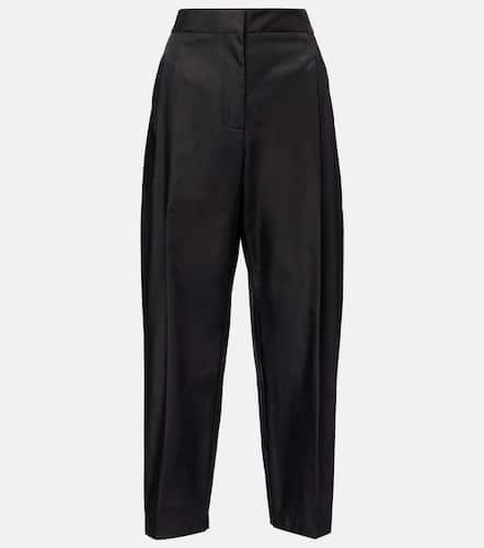 AlaÃ¯a Cropped high-rise satin tapered pants - Alaia - Modalova