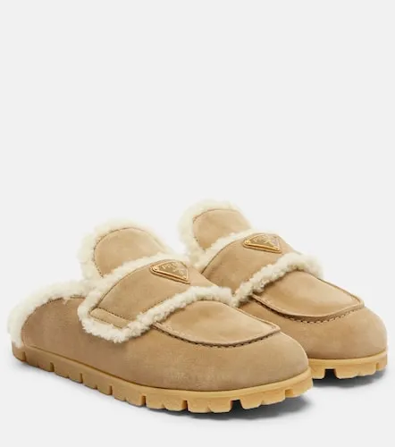 Prada Shearling-lined suede mules - Prada - Modalova