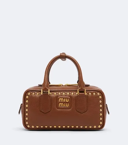 Arcadie studded leather top-handle bag - Miu Miu - Modalova